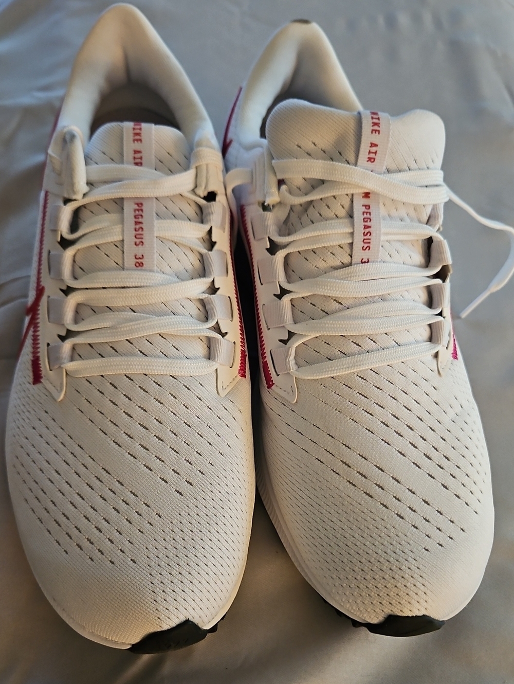 Nike Women’s White Sneakers with Red Swoosh